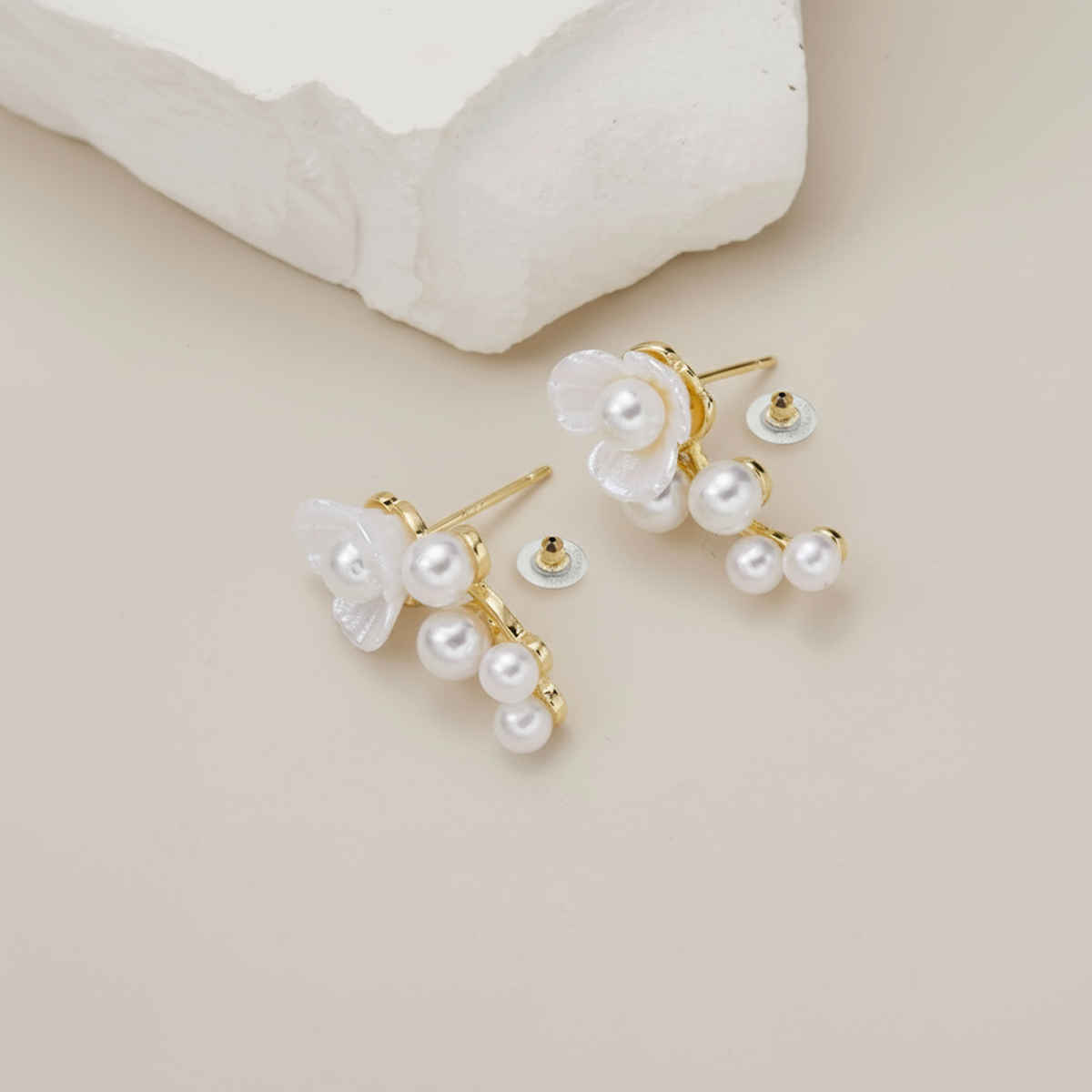 Unwind by Yellow Chimes Gold Plated White Pearl Stud Earrings