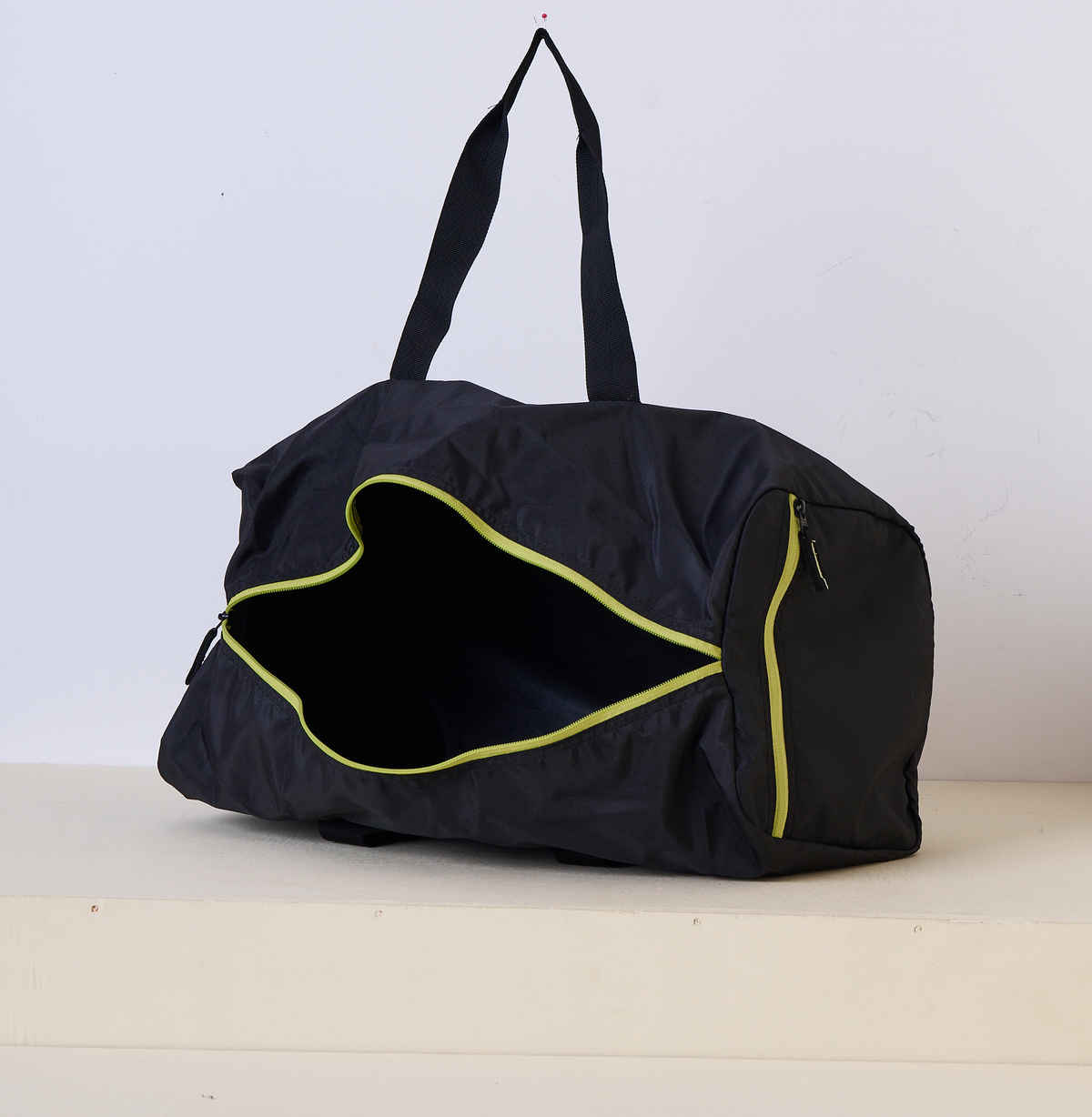 Wildcraft Unisex Solid Polyester 25 L Duffle Bag | Black and Yellow