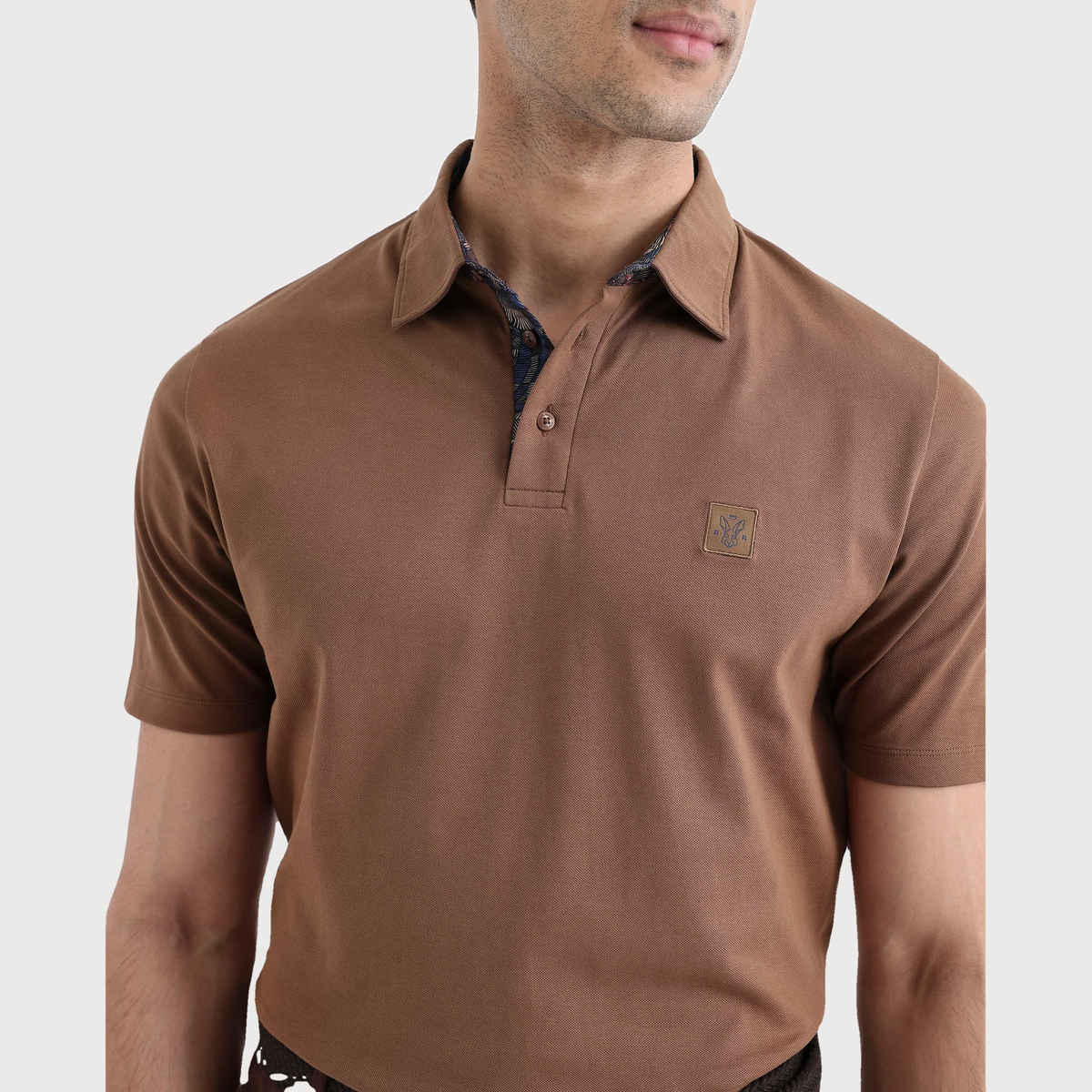 Rare Rabbit Men's Spencer Primary Polo T-shirt | Rust - S