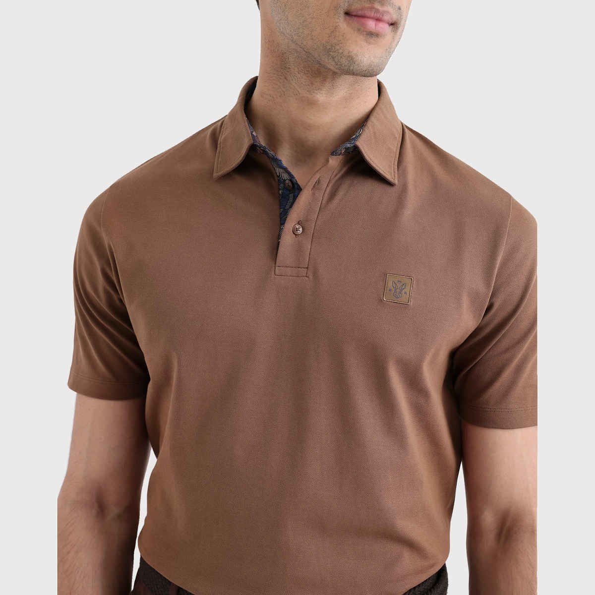 Rare Rabbit Men's Spencer Primary Polo T-shirt | Rust - XL