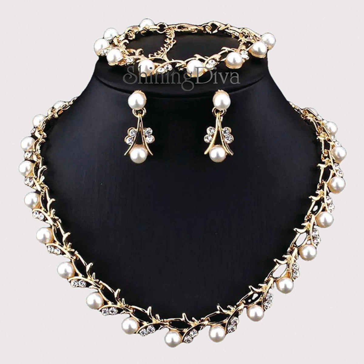 Shining Diva Fashion Gold Plated Pearl Necklace Earrings Bracelet Set for Women and Girls Sd10333s