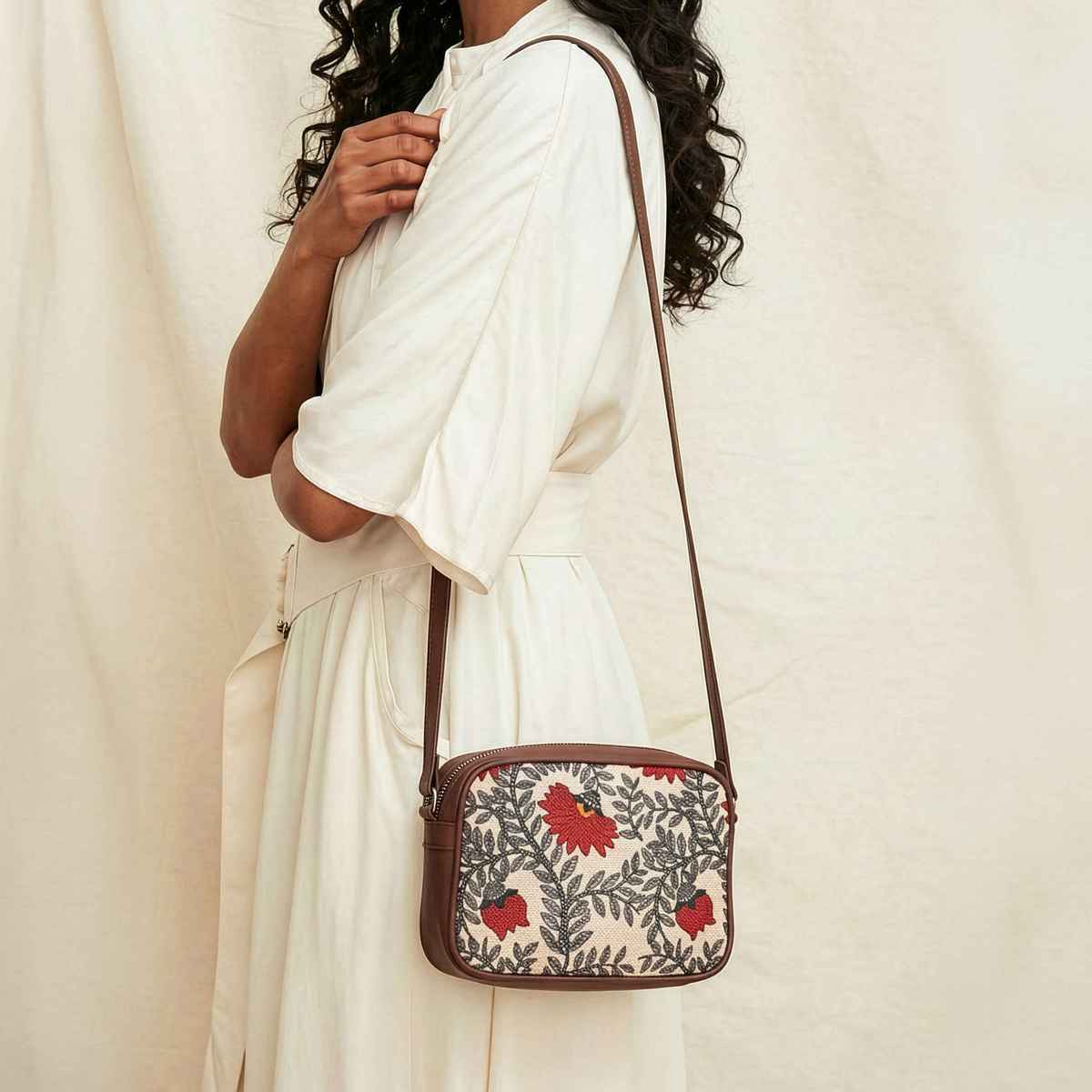 Zouk Women's Floral Vegan Leather and Handcrafted Fabric 2.4 L Sling Bag | Beige and Red | One Size