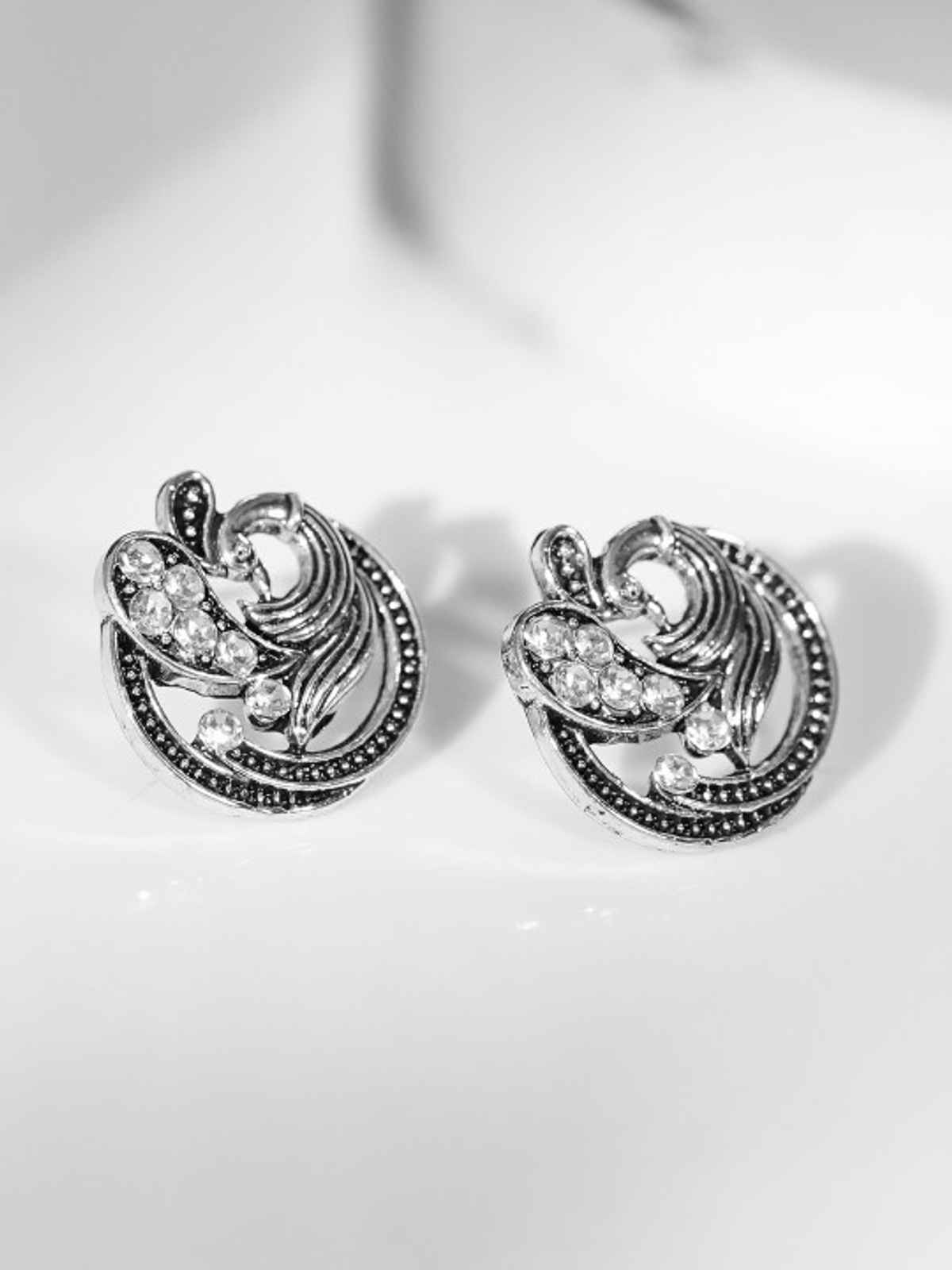 Rubans Silver-Plated American Diamond Studded Peacock Shaped Studs Earrings