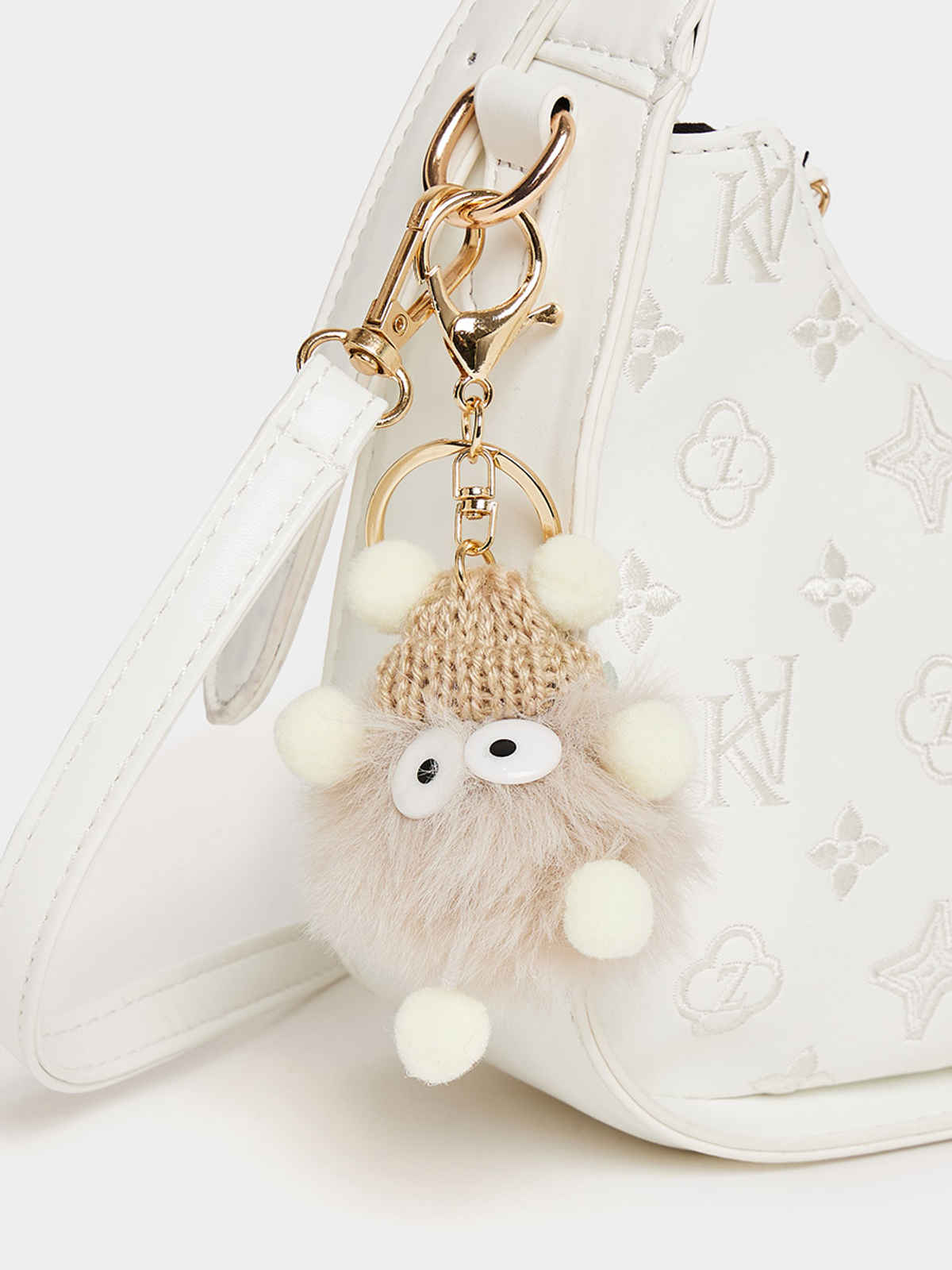 Styli Women's Printed Bucket Shoulder Bag With Tasells | White