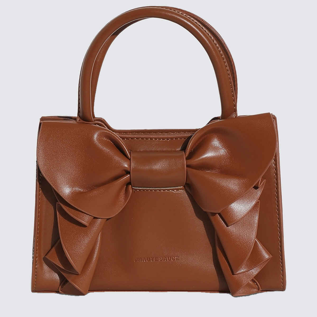 Haute Sauce Women's Solid Vegan Leather 2.7 L Handheld Bag | Brown - MInchesi