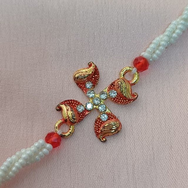 Gullak Swastik Minakari Moti Rakhi - Gold Metal