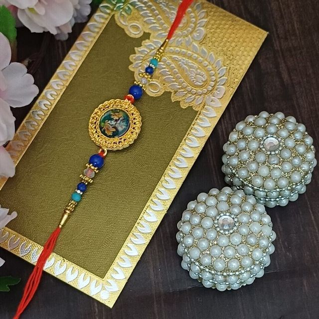 Gullak Radha Krishna Frame Rakhi - Divine Design