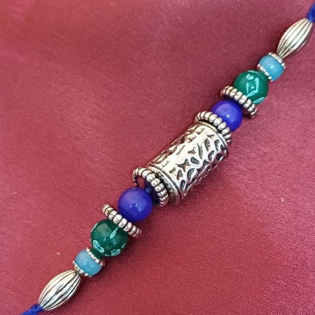 Gullak Antique Silver Taveej Rakhi - Cutwork