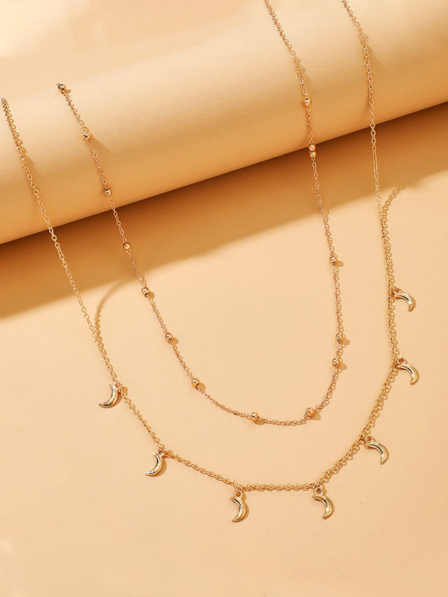Unwind By Yellow Chimes Gold-Toned Multilayered Crystal Studded Moon Charm Waist Chain