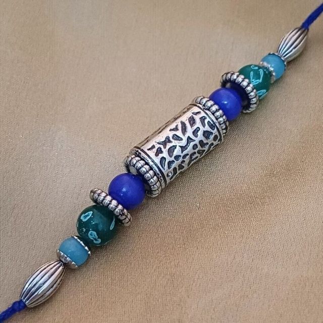 Gullak Antique Silver Taveej Rakhi - Cutwork