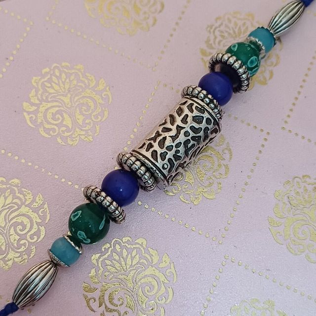 Gullak Antique Silver Taveej Rakhi - Cutwork