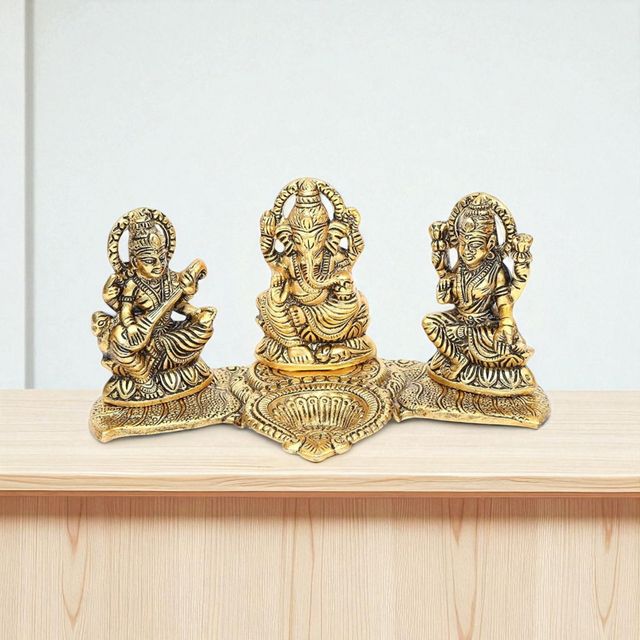 Devnidhii Diya Laxmi, Ganesh, Saraswati on Banana Leaves in Gold Polish
