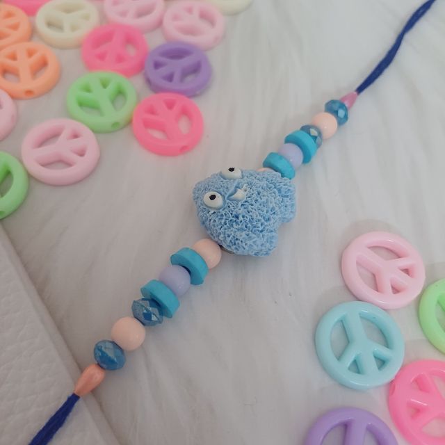 Gullak Blue Creature Kids Rakhi - Cute and Fun