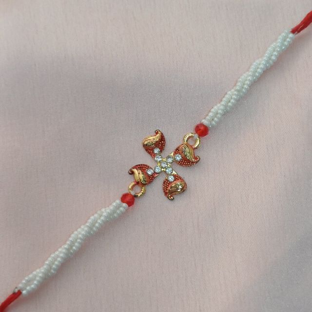 Gits Gulab Jamun Open & Eat (Tin)(1kg) & Gold Metal Swastik In Minakari With Twisted 3 Line Moti Rakhi For Brother(1pc) Combo