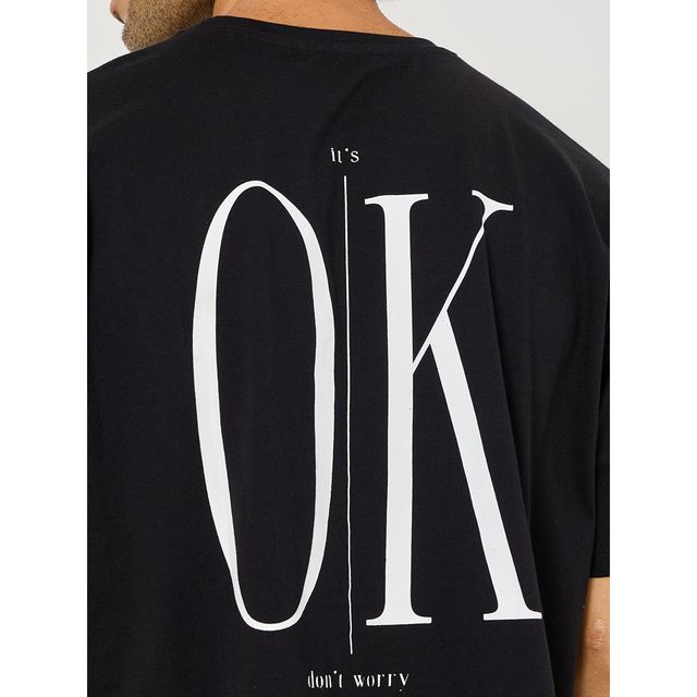 Styli Men's Slogan Print Back Printed Oversized Tee | Black - S