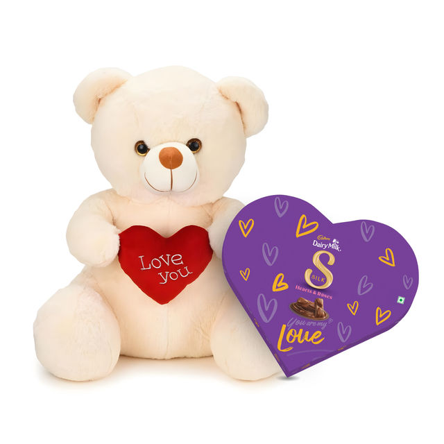 Cadbury Dairy Milk Silk Heart Shaped Valentines Chocolate Gift Box(135gms) & Webby Plush Teddy Bear With Heart | 25 Cm | Off White(1pc) Combo