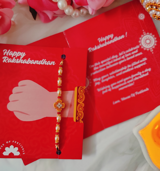 Snickers Peanut Filled Chocolate Bar Loaded With Delicious Roasted Peanuts(135gms) & Moti Dori Rakhi With Flower Design In Centre(1pc) Combo