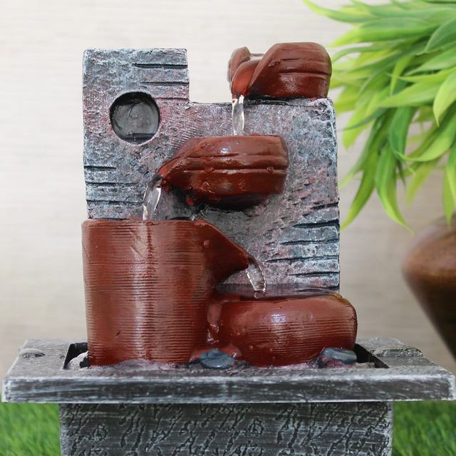 Tied Ribbons Decorative Table Top Water Fountain Showpiece (20.3 Cm)