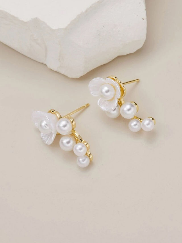 Unwind by Yellow Chimes Gold Plated White Pearl Stud Earrings