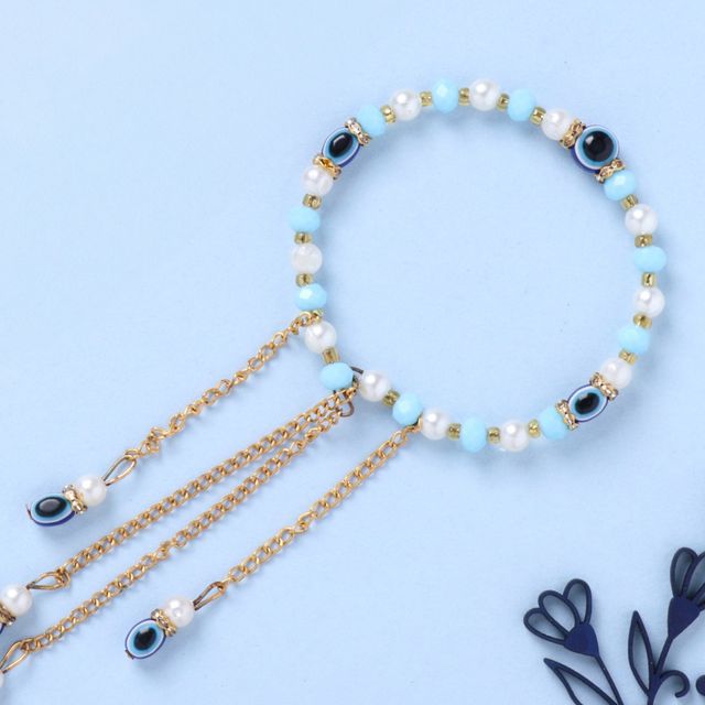 FlowerAura Bhaiya Bhabhi Turquoise Traditional Premium Stone and Pearl Rakhi - Elegant Pair