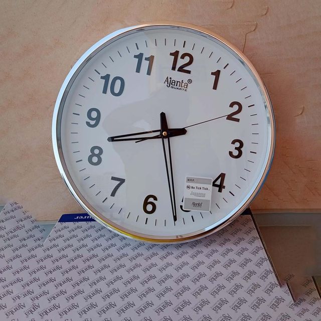 Ajanta Abstract White Quartz Wall Clock (32 x 32 x 3.5cm)