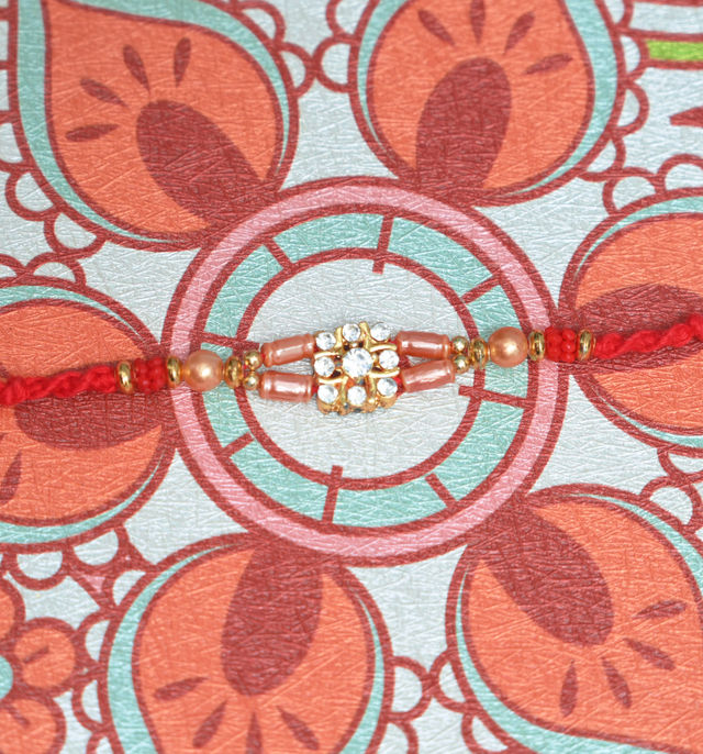 Aurum Small Diamond Rakhi With Multiple Beads - Elegant and Sparkling