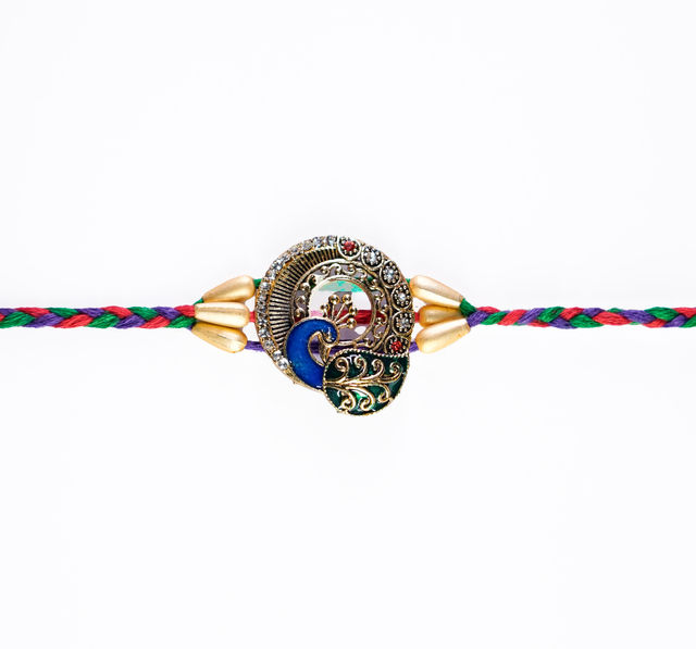Aurum Peacock Rakhi With Decorative Meenakari