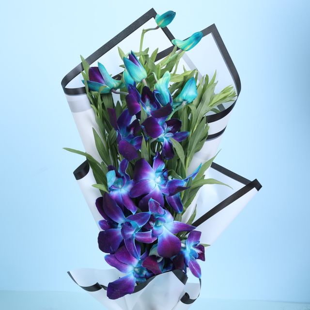 Floweraura Orchids In White Paper (1pc) & Chocolate Mousse Cake (1pc) Combo