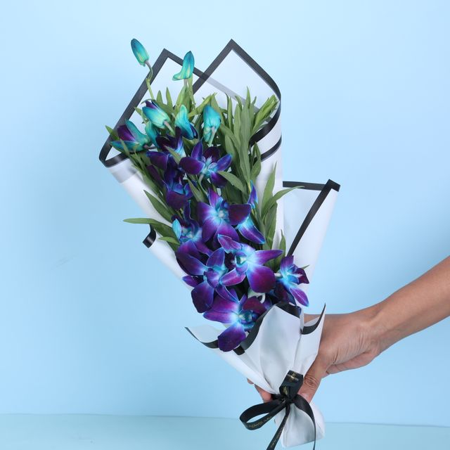 Floweraura Orchids In White Paper (1pc) & Chocolate Mousse Cake (1pc) Combo
