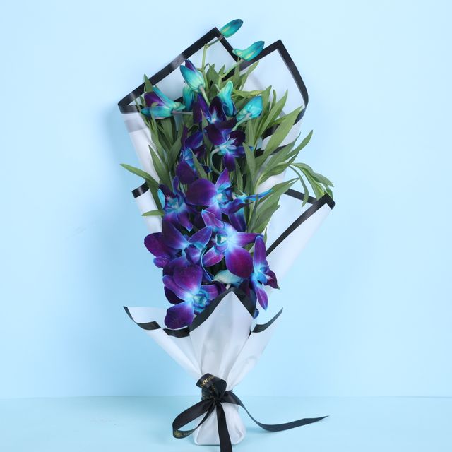 Floweraura Orchids In White Paper (1pc) & Chocolate Mousse Cake (1pc) Combo