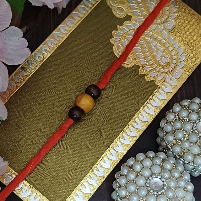 Lotte Choco Pie Chocolate Cake(168gms) & Red And Yellow Mauli Rakhi With Beads(1pc) Combo