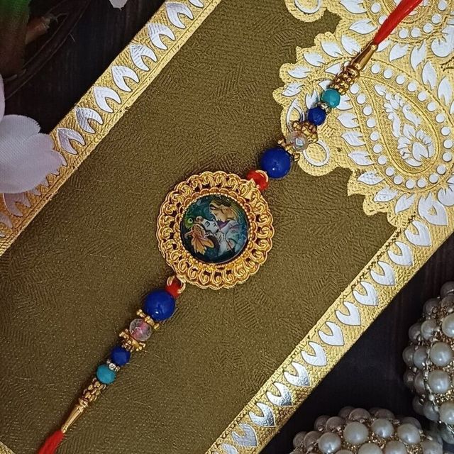 Gullak Radha Krishna Frame Rakhi - Divine Design
