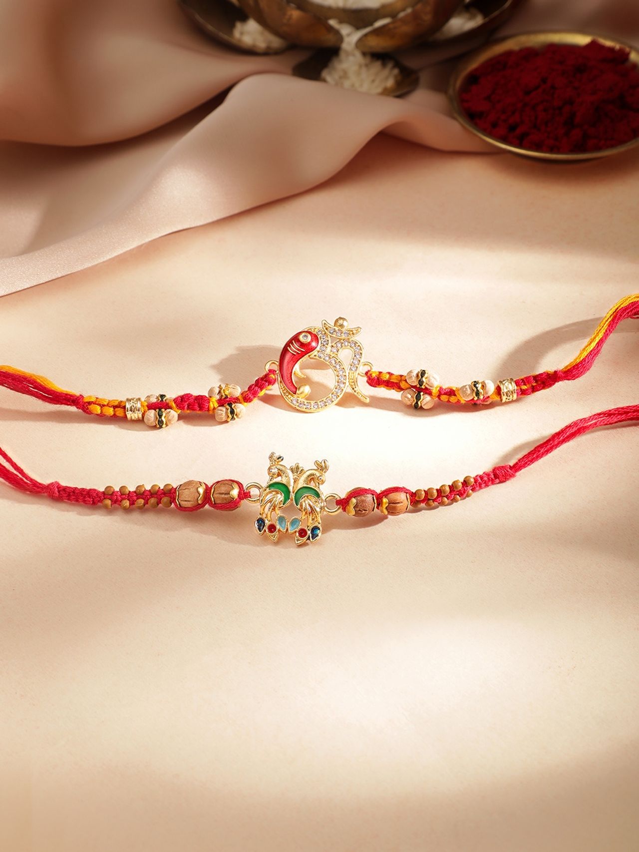 Rubans Gold Toned Set Of 2 Peacock And Om Motif Stone Studded Rakhi