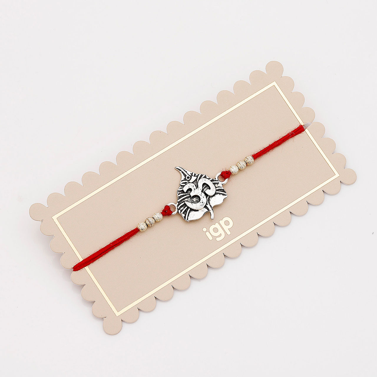 IGP Paan Leaf Om metal Rakhi