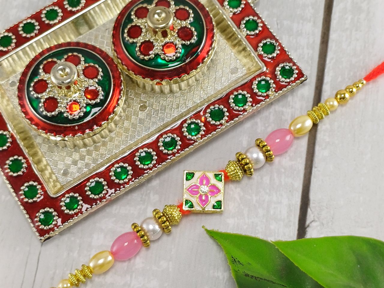 Gullak Kundan Pink And Green Minakari Rakhi - Vibrant and Artistic