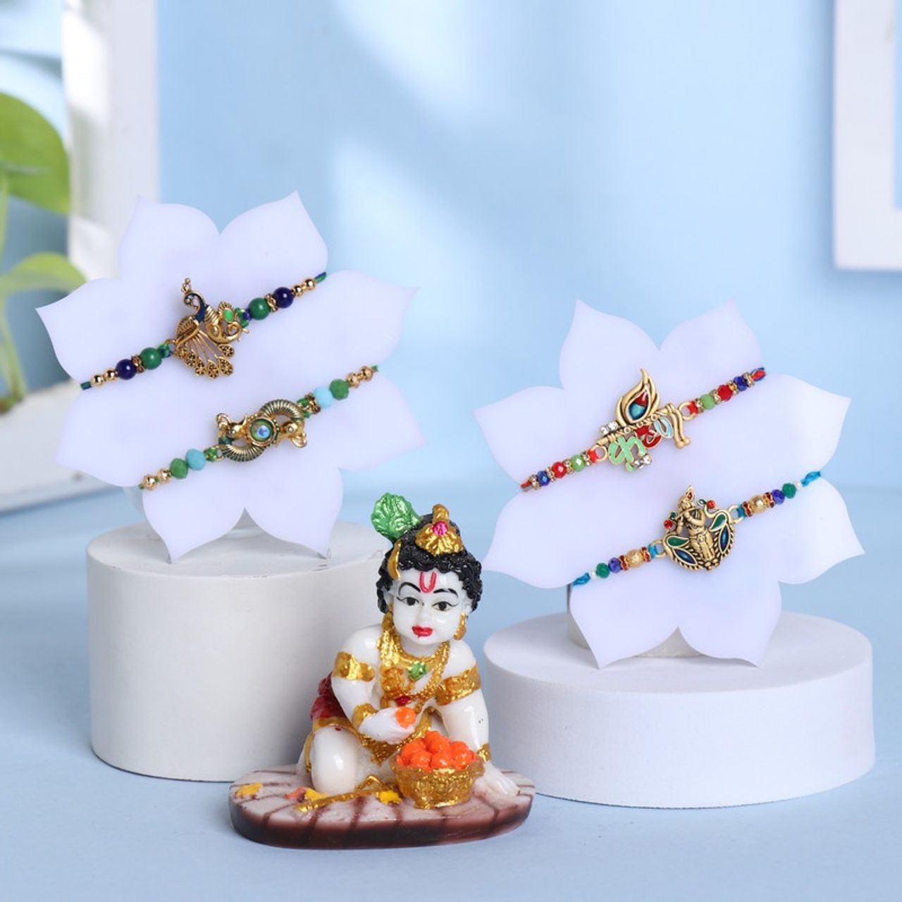 FlowerAura Big Krishna Idol With 4 Traditional Rakhi - Divine and Beautiful