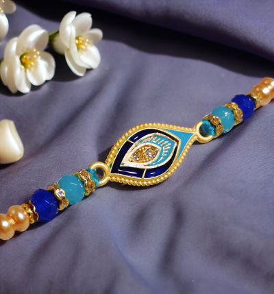 House Of Festivals Blue Shade Krishna Morpankh Pendant Rakhi With Moti - Divine Design