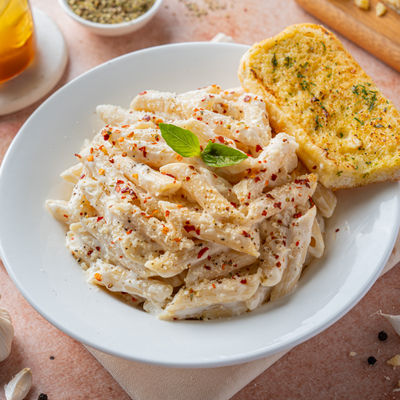 Alfredo Penne Pasta with Italian Garlic Bread