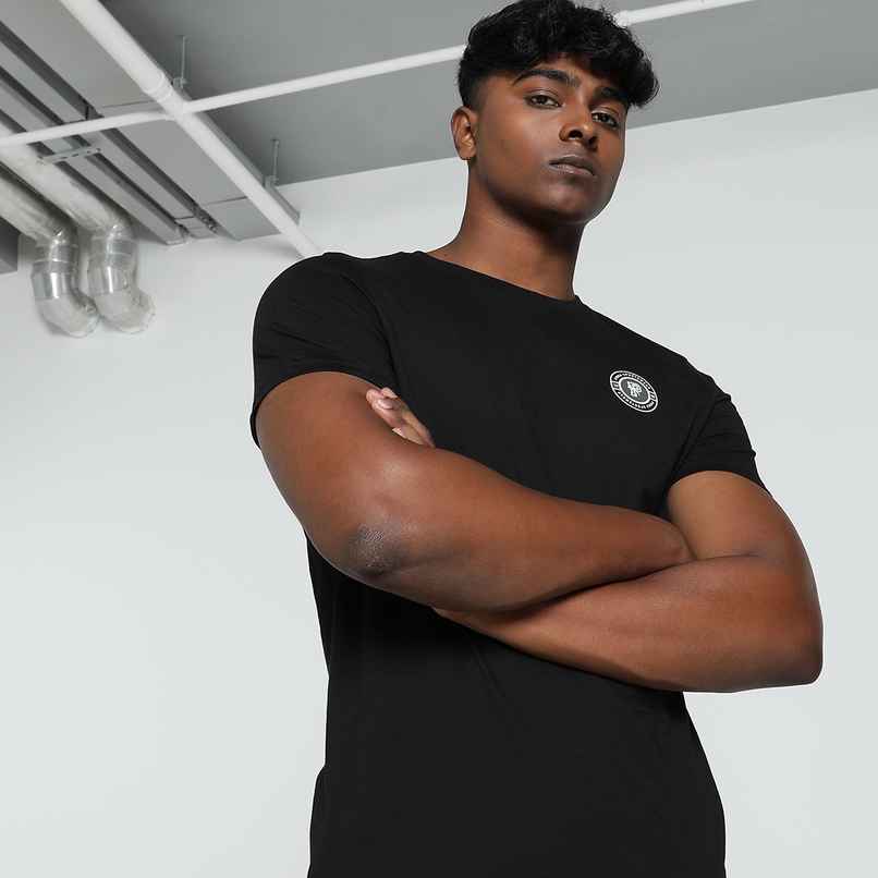 Puma Men's Round Graphic SS Tee | Black - M Puma Men's Round Graphic SS Tee | Black - M