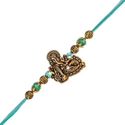 Religious Golden Lord Ganesha Designer Raksha Bandhan Rakhi for Bhai Bhaiya with Roli Chawal Pack (eCraftIndia) Religious Golden Lord Ganesha Designer Raksha Bandhan Rakhi for Bhai Bhaiya with Roli Chawal Pack (eCraftIndia)