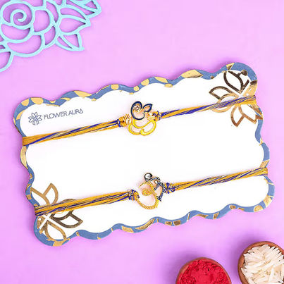 Religious Divine Om N Ganesha Rakhi Duo (Floweraura)