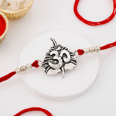 Religious Paan Leaf Om metal Rakhi (IGP)