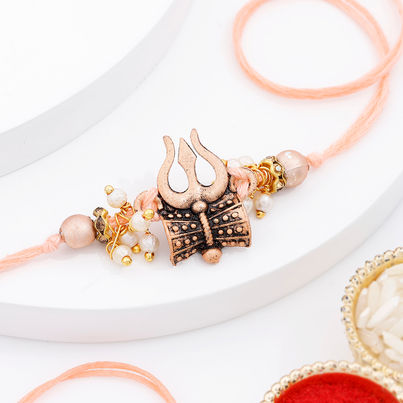 Religious Beads Trishul Rakhi (IGP)