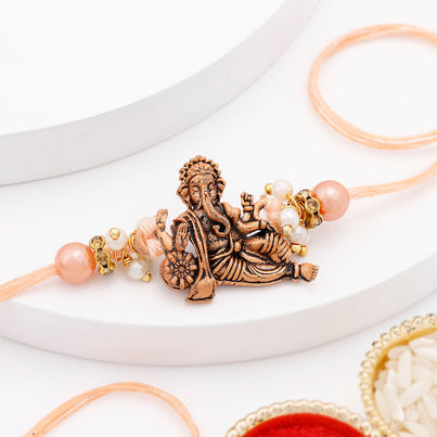 Religious Beads Ganesha Rakhi (IGP)