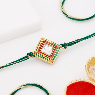 Stone Cz Stone And Meena Rakhi (IGP) Stone Cz Stone And Meena Rakhi (IGP)