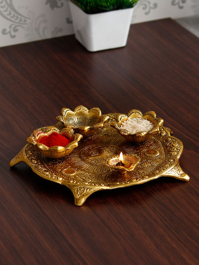 eCraftIndia Golden Metal Swastik Designer Pooja Thali with 3 Bowls and 1 Diya eCraftIndia Golden Metal Swastik Designer Pooja Thali with 3 Bowls and 1 Diya