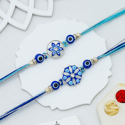 Peacock Floral Evil Eye Rakhi for Brother | Designer Rakhi Set with Roli Chawal Pack (eCraftIndia) Set of 2 Peacock Floral Evil Eye Rakhi for Brother | Designer Rakhi Set with Roli Chawal Pack (eCraftIndia) Set of 2