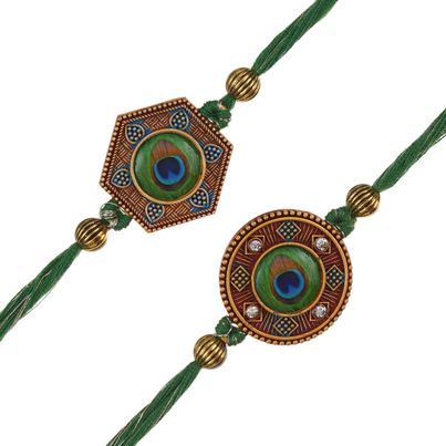Peacock Feather Designer Rakhis for Brothers & Roli Chawal Pack (eCraftIndia) Set of 2 Peacock Feather Designer Rakhis for Brothers & Roli Chawal Pack (eCraftIndia) Set of 2