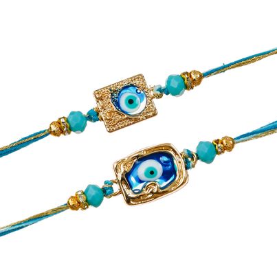 Evil Eye Golden Blue Rakhi for Bhaiya, Bhai, Bhabhi and Kids with Roli Chawal Pack (eCraftIndia) Rakhi Set of 2 Evil Eye Golden Blue Rakhi for Bhaiya, Bhai, Bhabhi and Kids with Roli Chawal Pack (eCraftIndia) Rakhi Set of 2