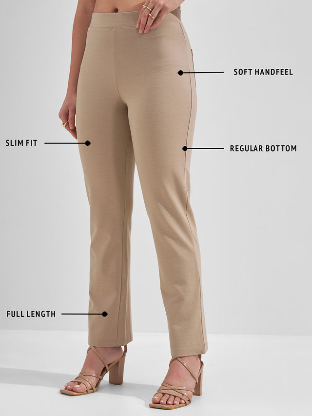 Tokyo Talkies Women Solid Slim Fit Mid Rise Boot Cut Trouser - Buy